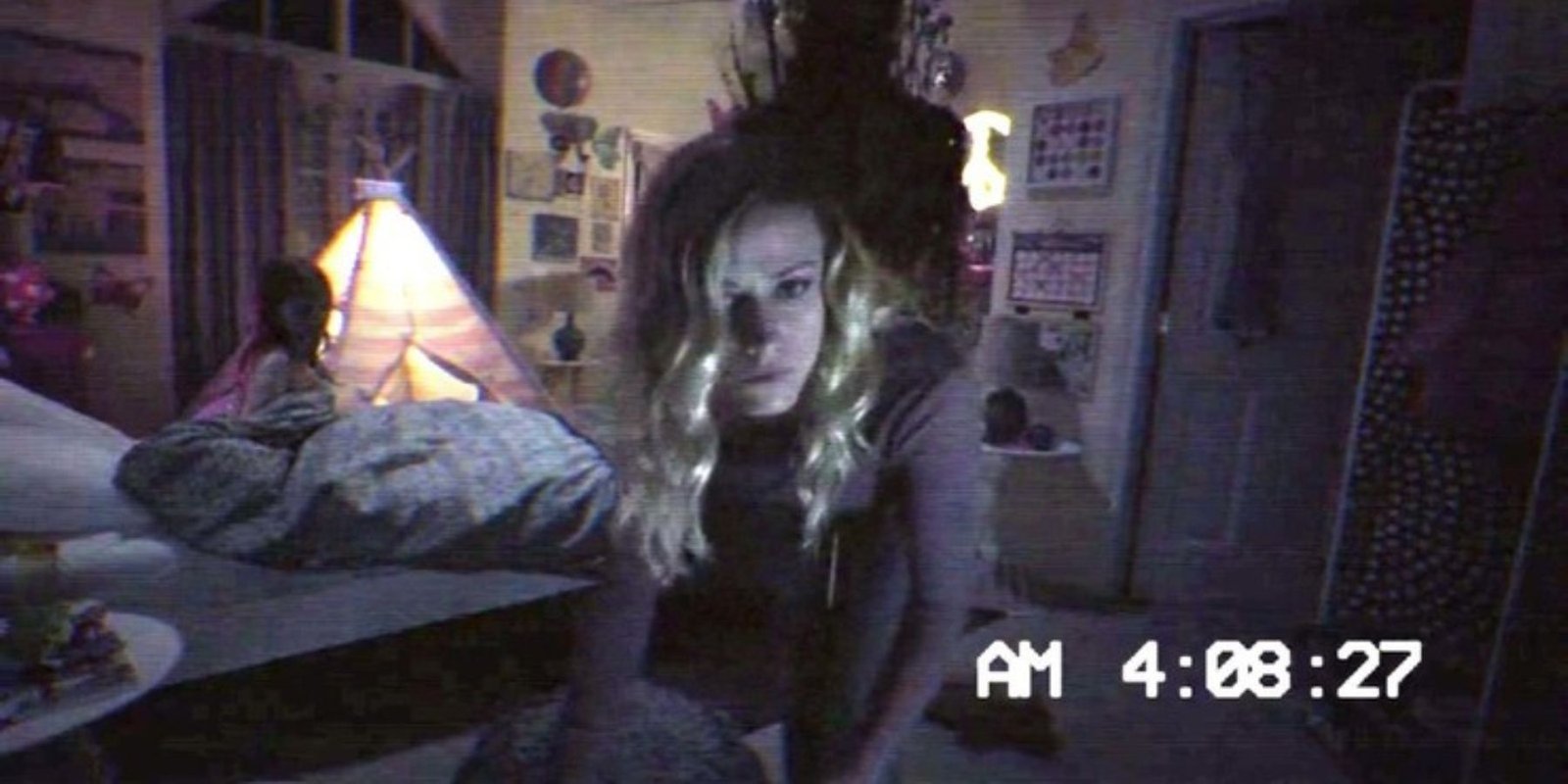 Video footage of a woman and child in Paranormal Activity: The Ghost Dimension